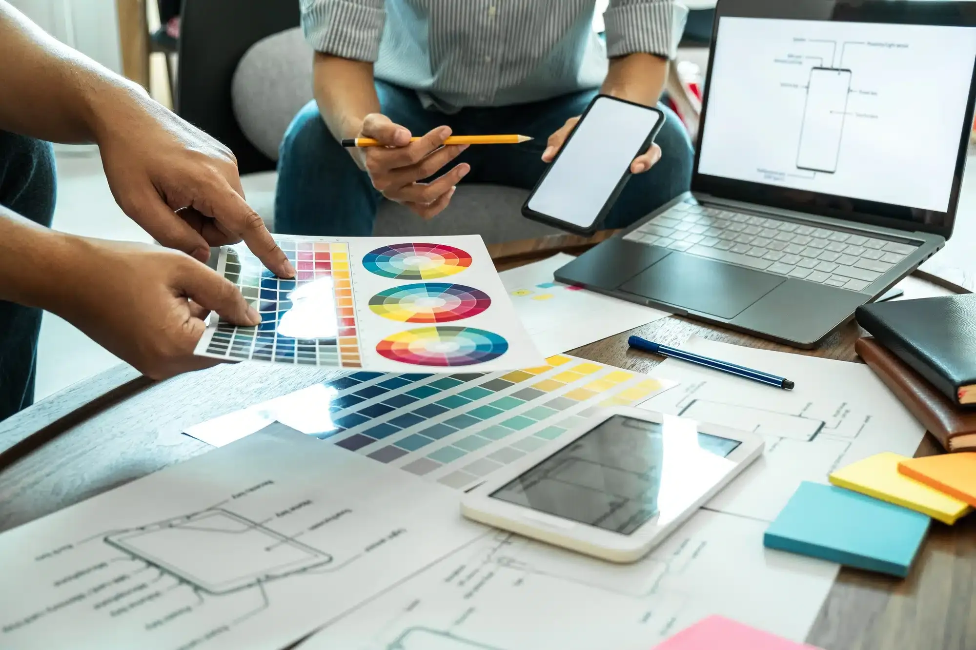 Team of Creative Web/Graphic Designer planning, drawing website ux app for mobile phone application